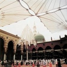 Mechanically operated Teflon umbrellas in the inner courtyard of the Prophet's Mosque Click to view high resolution version